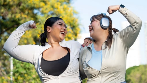 Female best friends celebrating exercise goals